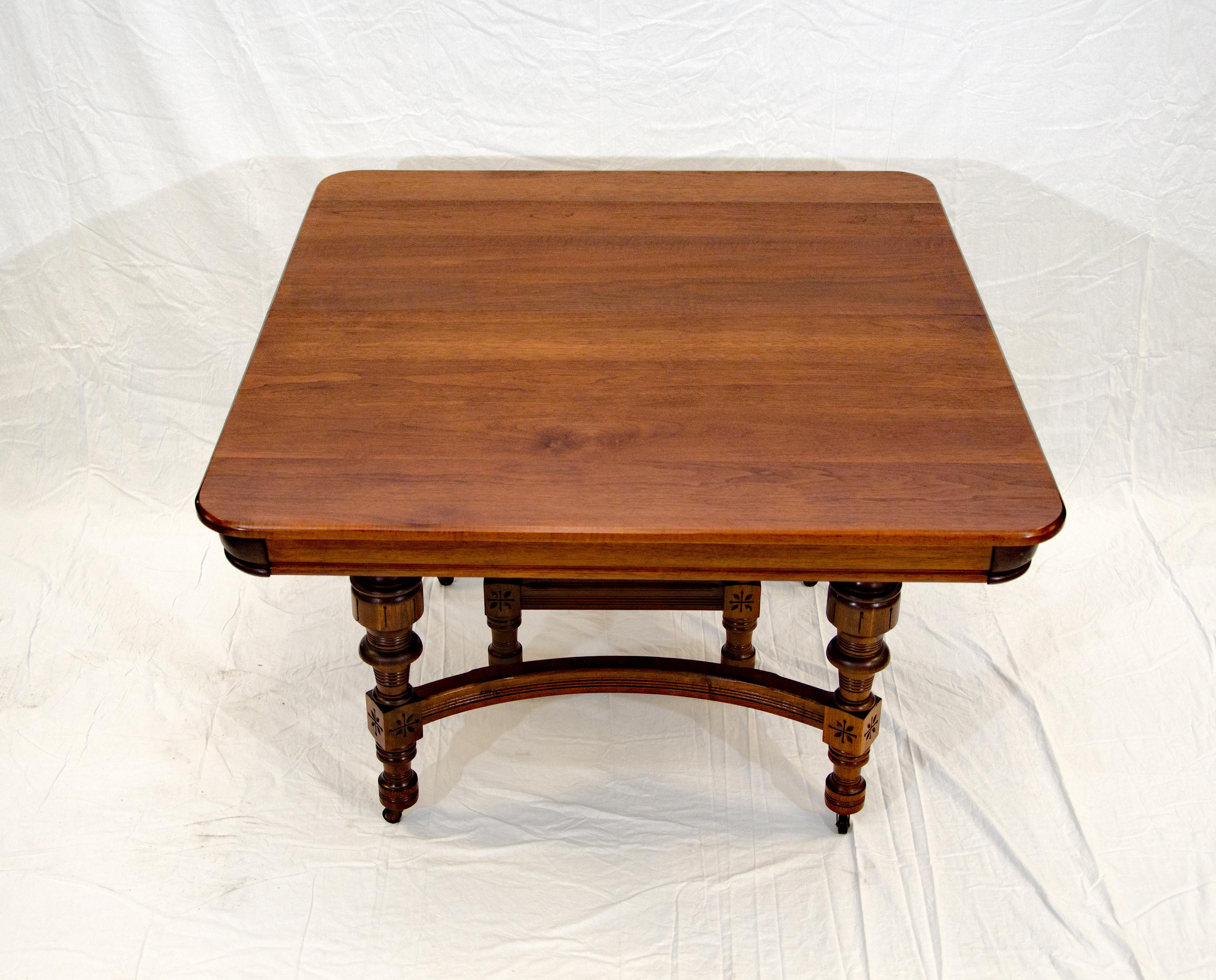 Eastlake Victorian Walnut Dining Table with Two Leaves