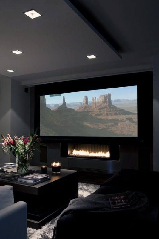 Modern Home Theater Design With Fireplace Under Projector Screen