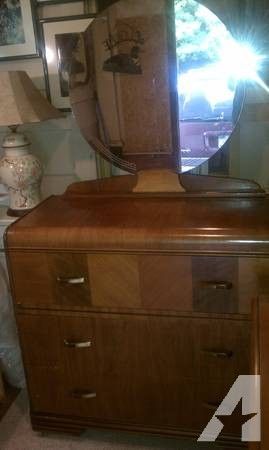 Art deco water fall dresser with three drawers and round mirror