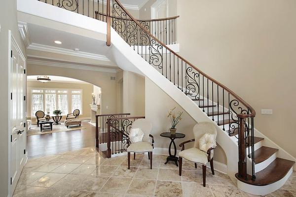 table and chairs under staircase 