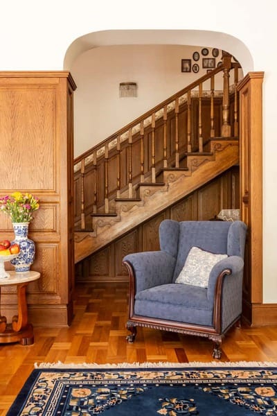 blue accent chair in living space 