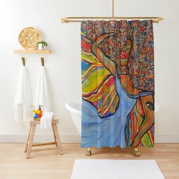 Colorful artistic shower curtain featuring an abstract dancing figure in a bright bathroom.